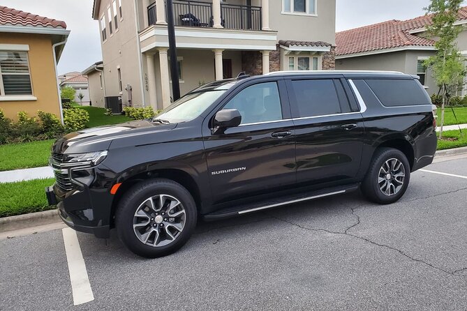 Orlando Airport MCO to any Theme Park Resort Hotel - Meet Your Chauffeur Inside Orlando Airport Baggage Claim