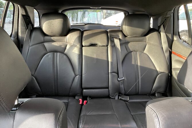 Orlando Airport MCO to Universal Orlando Resort Private transfer - Inside the ride: comfort, Wi‑Fi, and the Tesla factor