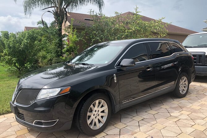 Orlando International Airport MCO to Lake Buena Vista Resorts - How Pickup Works Without Guesswork (Email, Then SMS the Day Before)