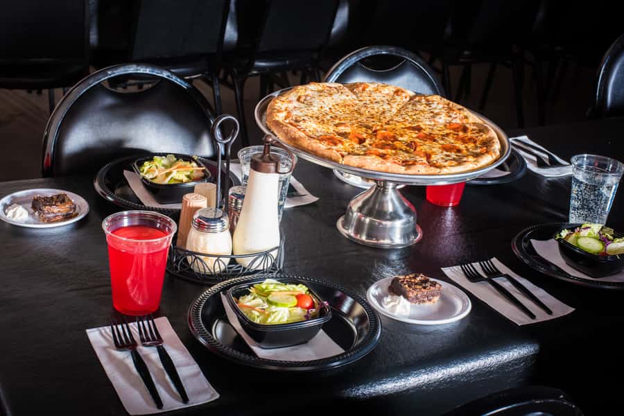 Orlando: The Outta Control Magic Comedy Dinner Show - Your meal isn’t an afterthought: unlimited pizza, salad, dessert, and drinks