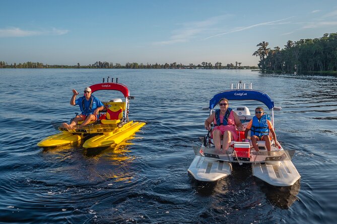 Tour of Lakes Escape by Personal Catamaran - Two-Way Radio + Guide Stories: The Real Entertainment